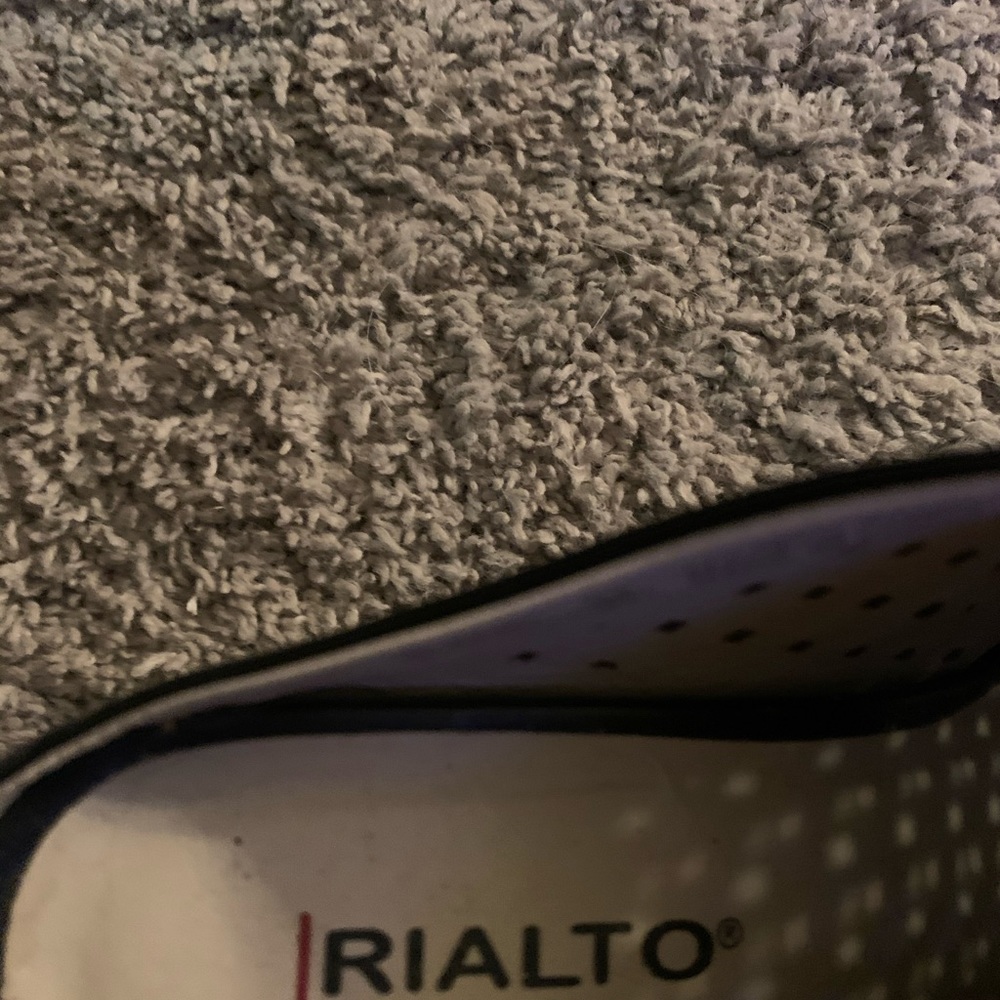 Black peep toe shoes. Tiny scuff on right toe.